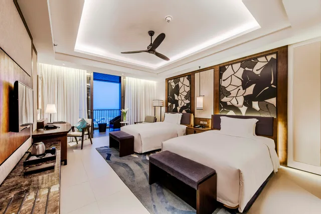 غرفة تنفيذية بسريرين منفصلين بإطلالة على البحر، Hilton Wenchang 4/5