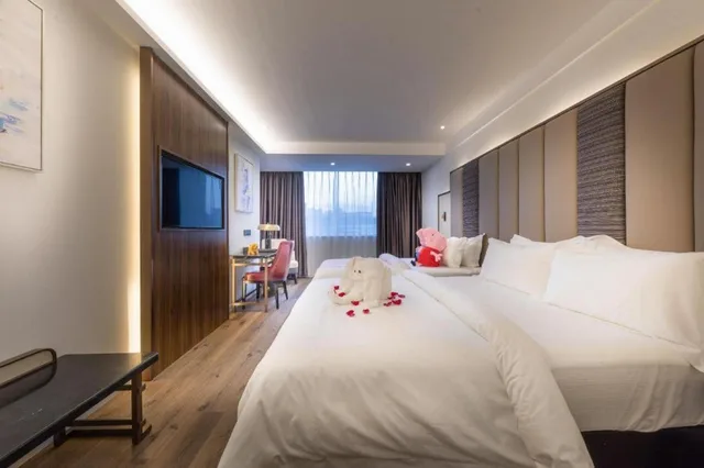 غرفة ديلوكس بسرير كوين بإطلالة، Metropolo Jinjiang Hotel (Haikou East High-speed Railway Station, Normal University) 1/1