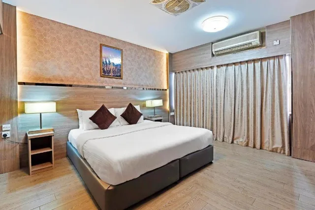 غرفة ديلوكس بسرير كينج، OYO 338 Transworld Hotel 5/8