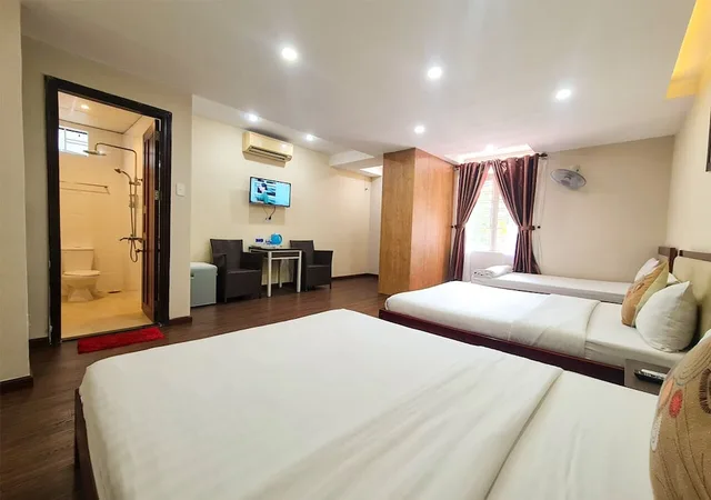 سكن مشترك مختلط عائلي بسرير كوين وسريرين كوين بإطلالة على الحديقة، QUAN QUAN HOTEL 2/5