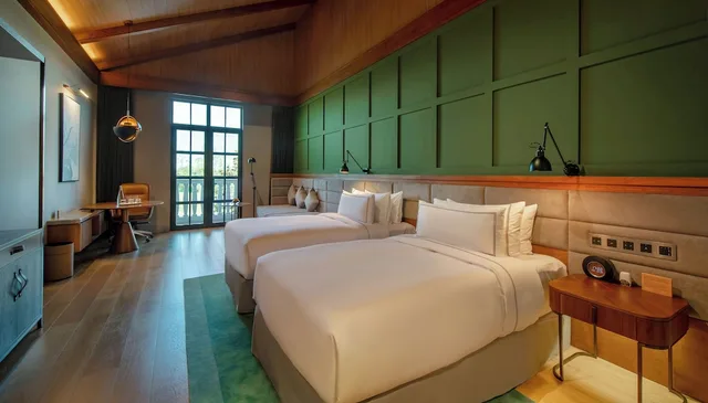 غرفة متصلة ديلوكس عائلية بسرير كينج مع أريكة، Melia Shanghai Parkside 1/3