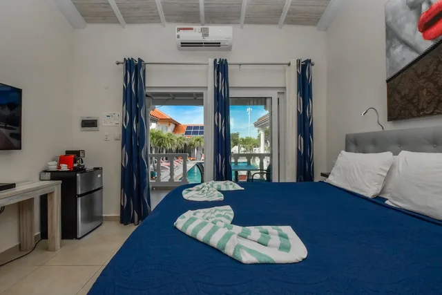 Loft, Suite, 1 King and 1 Single Beds, Pool Side، Swiss Paradise Aruba 4/7
