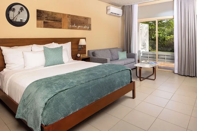 Collection, King Bed, Garden View، Wyndham Palmas Beach & Golf Boutique Resort 1/7