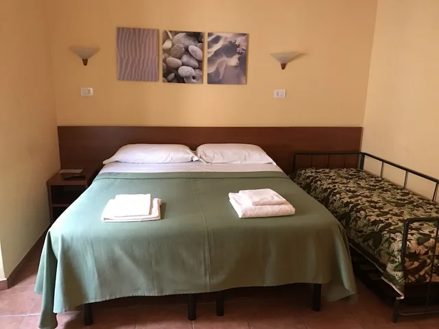 غرفة ثلاثية بسرير مزدوج وسرير فردي، San Daniele Bundi House 3/4