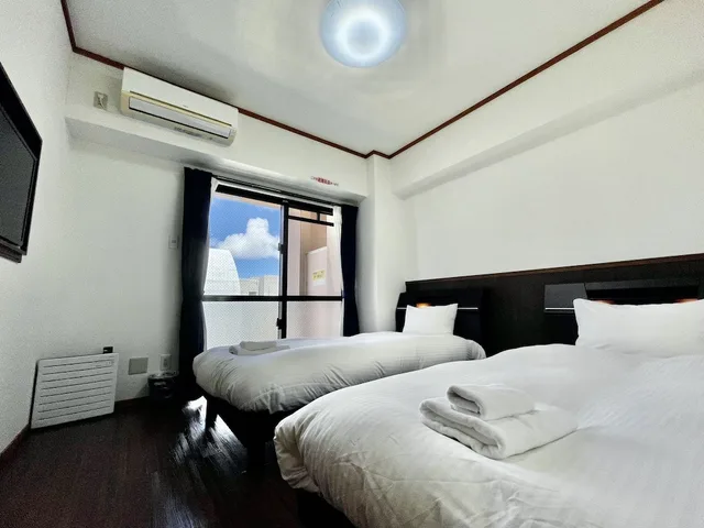 غرفة عائلية بسريرين منفصلين وفرشتي فوتون، Hotel Tenshi Kan Kumoji 2/4