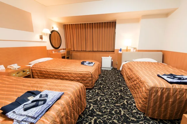 غرفة ثلاثية بسريرين منفصلين مع أريكة في الملحق، Hotel Global View Kushiro 5/6