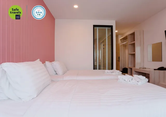 غرفة قياسية بسريرين منفصلين بإطلالة على المدينة، The Echo Hotel 5/7