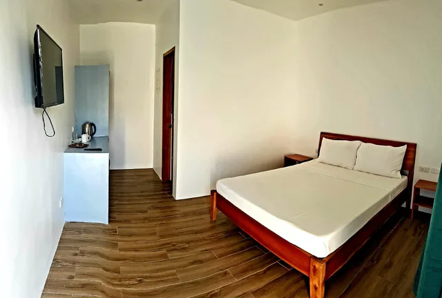 غرفة قياسية بسرير كوين، Positano Alona Beach Panglao 1/1