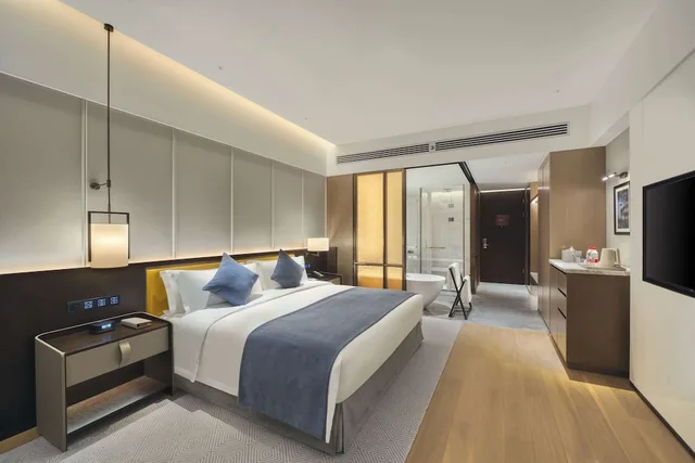 غرفة تنفيذية بسرير كينج، Wyndham Xiong'an 1/3