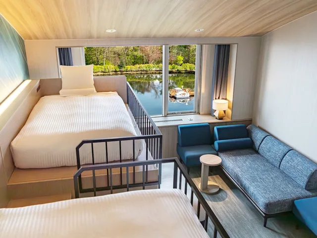 غرفة عائلية بأسرّة بطابقين مع أريكة، IZUMIGO KIYOSATO KOGEN HOTEL 4/5