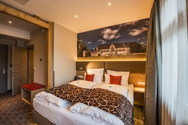 غرفة كومفورت بسرير كوين، Akzent Hotel Villa Saxer 1/4