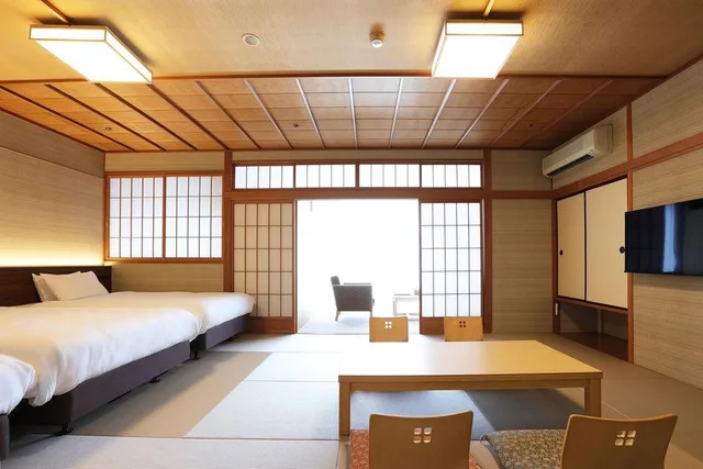 Japanese Modern Triple Room with open air bath، Mantenno Tsujinoya 1/1