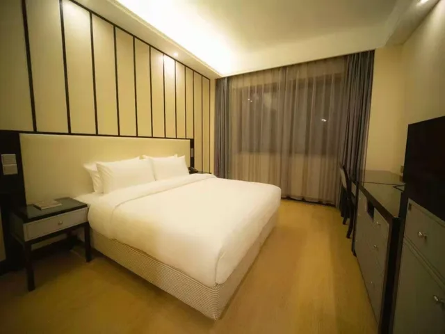 غرفة بزنس بسرير كينج، Starway Hotel Qingdao Olympic Sailing Center 1/1