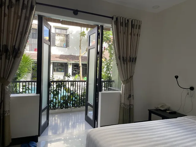 غرفة ديلوكس بسرير كينج بشرفة، Starfruit Homestay Hoi An 6/10