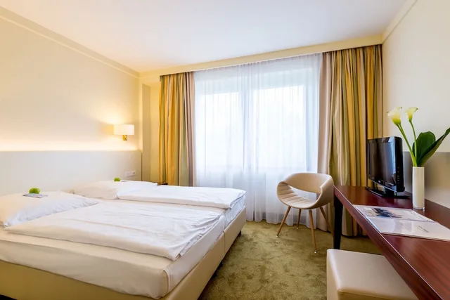غرفة قياسية بسرير مزدوج أو سريرين منفصلين، relexa hotel Stuttgarter Hof 1/3