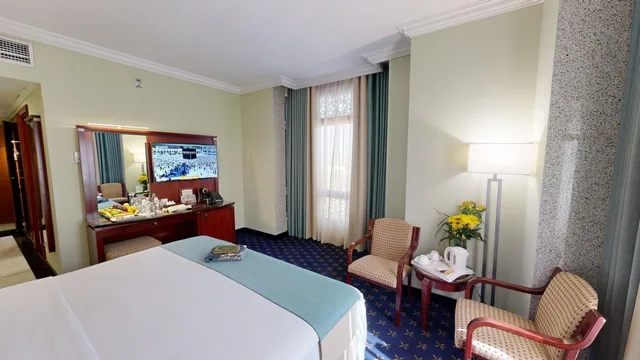 غرفة بسرير مزدوج أو سريرين منفصلين، المنى كريم ليدر(Al Muna Kareem Hotel- EX Leader) 1/10
