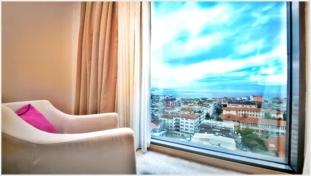 غرفة ديلوكس بسرير كينج وسرير فردي مع أريكة، GRAND ASYA HOTEL 9/10