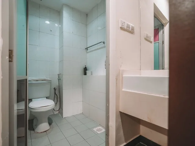 Superior, Triple, 1 Double and 1 Single Bed, No Window، A Hotel Desker 1/1
