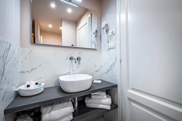 جناح ملكي، Hotel la Scaletta 4/6