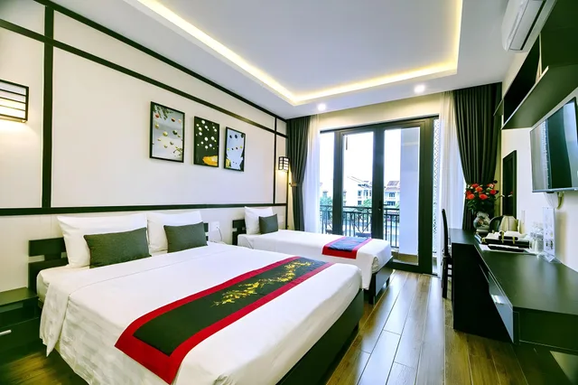 غرفة عائلية بإطلالة على النهر بشرفة، Hoi An Riverland Villa - Hoi An Center 1/2
