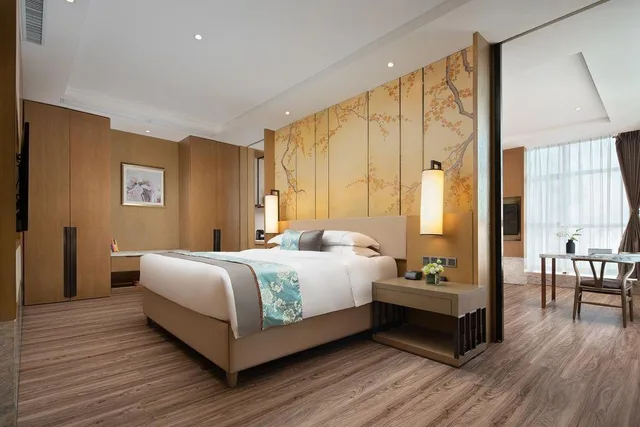 جناح ديلوكس بسرير كوين بإطلالة على النهر، Sanya Shuang Da International Hotel 1/1