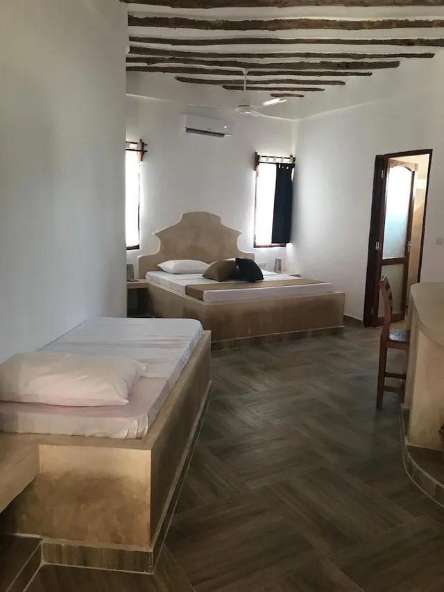 غرفة ديلوكس ثلاثية بسرير كوين وسرير فردي، Sea View Lodge Boutique Hotel 2/2
