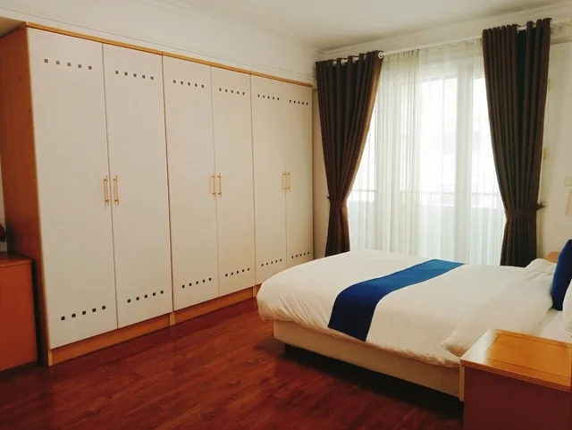 شقة ديلوكس بسرير كوين بإطلالة على المدينة بغرفة نوم واحدة، ROSE GARDEN RESIDENCES 3/4