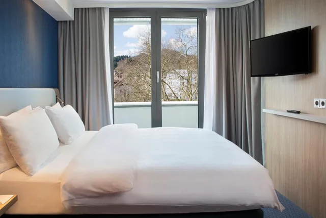 غرفة قياسية بسرير كوين مع أريكة في طابق منخفض، HOLIDAY INN EXPRESS BADEN BADEN 4/9