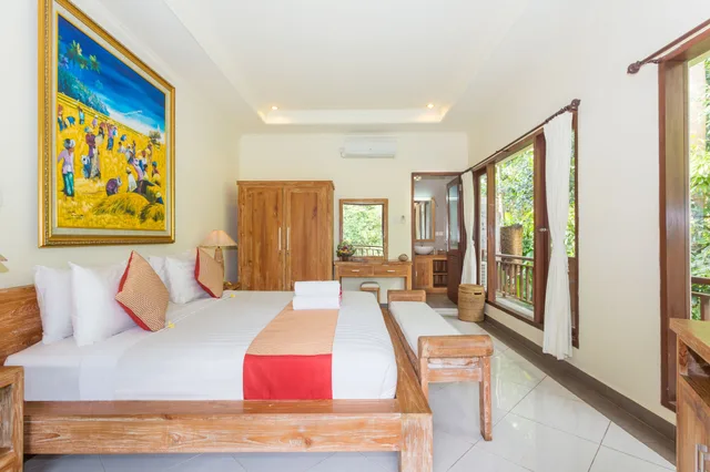 غرفة ديلوكس بسرير مزدوج بإطلالة على الحديقة، Puri Payogan Villa 1/5
