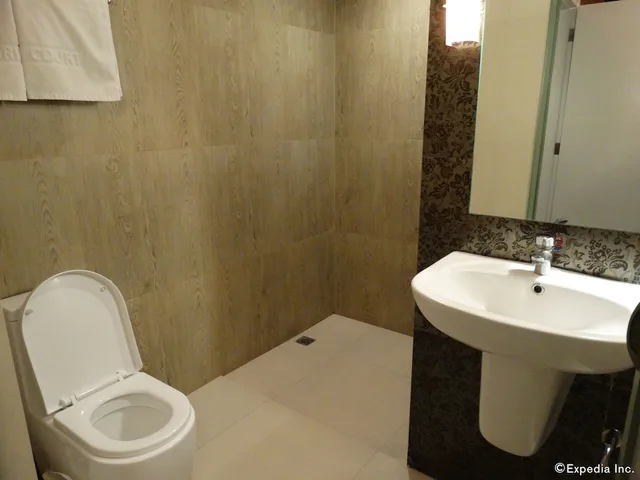 غرفة ديلوكس بسرير كوين، Victoria Court Cuneta 9/10