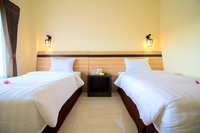 غرفة سوبيريور بسريرين منفصلين للمدخنين، HOTEL PURI INDAH & CONVENTION 1/4