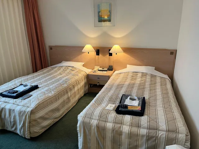 غرفة بسريرين منفصلين في الملحق، Jasmac Plaza Hotel 1/5