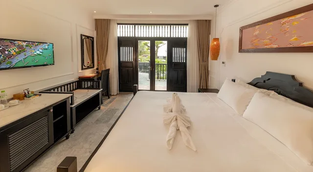 غرفة ديلوكس بسرير كينج بإطلالة على النهر، Hoi An Coco River Resort Spa 1/9
