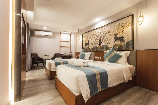 غرفة عائلية بسرير كينج وسرير كوين، Thapae Twins Hotel 5/7