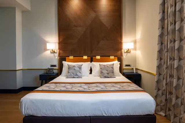 غرفة بسرير كينج مع سرير إضافي، Grand Hotel Torre Fara 2/4