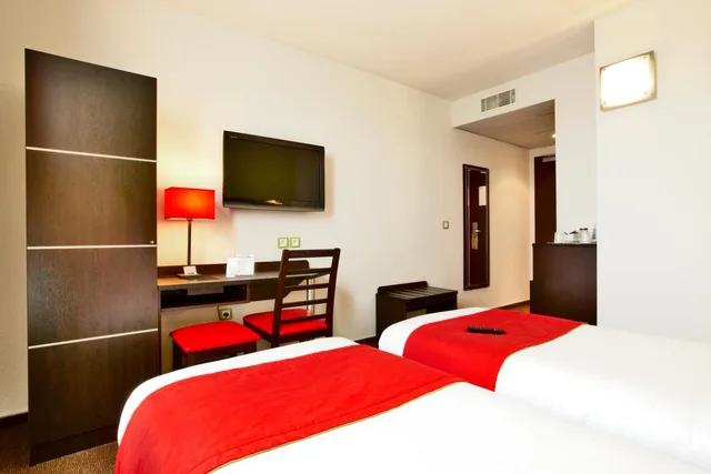 غرفة بسريرين منفصلين، Hotel Kyriad Design Enzo Thionville 5/10