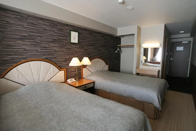 غرفة بسريرين منفصلين بإطلالة على الجبل مع أريكة، Tominoko Hotel 1/1