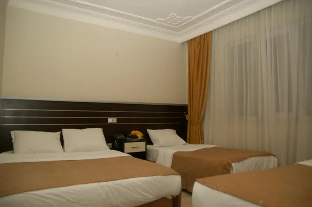 غرفة اقتصادية رباعية، Merdan Hotel 1/7