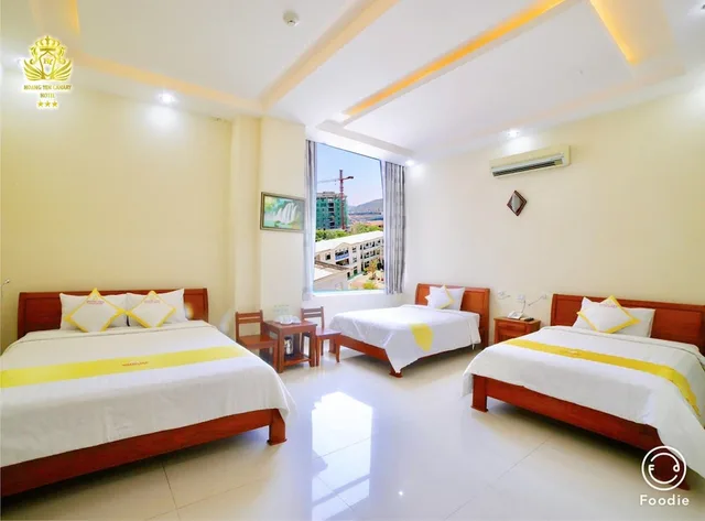 غرفة عائلية رباعية بسريرين مزدوجين بإطلالة جزئية على البحر، Hoang Yen Canary Hotel 1/10