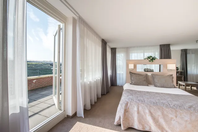 غرفة فاخرة بسرير مزدوج بشرفة، Fletcher Wellness Hotel Kamperduinen 1/2