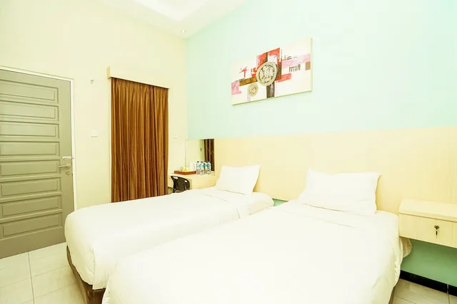 غرفة قياسية بسريرين منفصلين، Ardhya Guest House 3/9