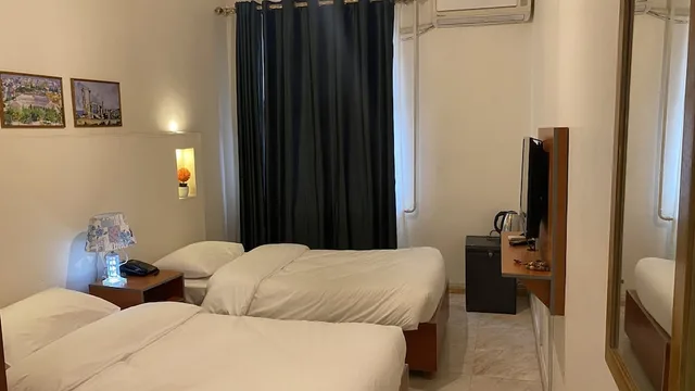 غرفة ثلاثية بثلاثة أسرّة، Newpark Hotel Amman 4/10