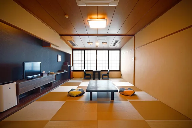 غرفة يابانية عصرية بفراش فوتون بأرضية تاتامي، Isawa Onsenkyo Ryokan Kisen 1/1