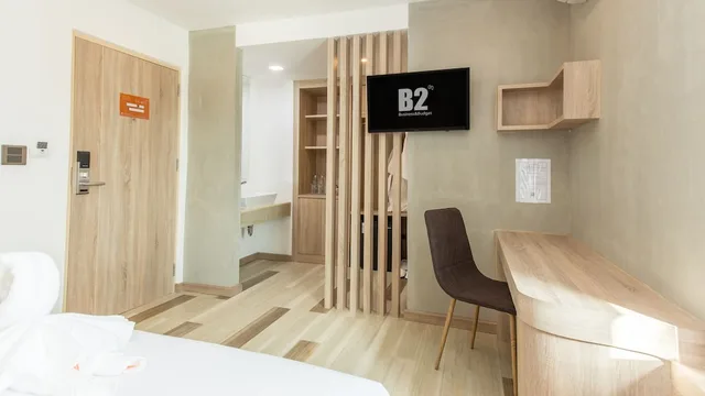 غرفة ديلوكس ثلاثية بسرير مزدوج وسرير فردي، B2 Ubon Premier Hotel 2/2