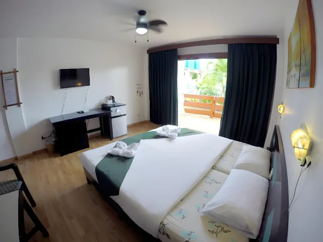 غرفة ديلوكس بسرير كوين، Harmony Hotel 2/3
