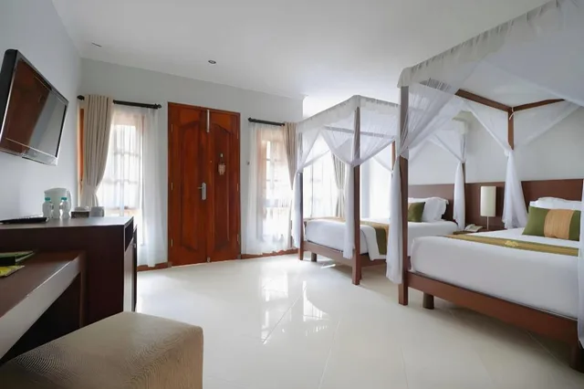 غرفة عائلية بسرير مزدوج وسريرين منفصلين، Adi Dharma Hotel Legian 2/3