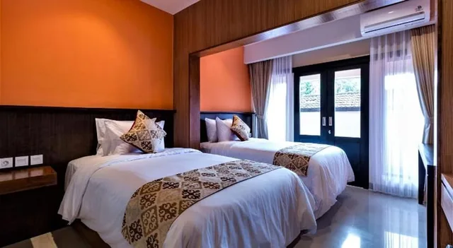 جناح ديلوكس بسرير مزدوج وسرير فردي، Ab Hotel Kuta 3/8