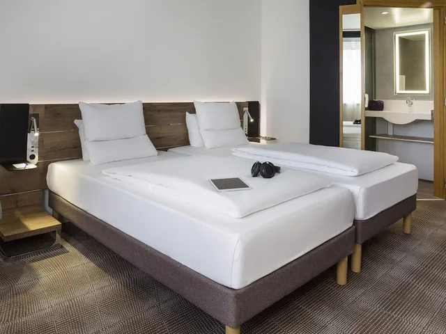 غرفة سوبيريور بسريرين منفصلين، NOVOTEL LAUSANNE BUSSIGNY 1/8