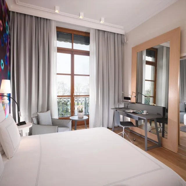 غرفة ديلوكس بسرير كينج بإطلالة على الحديقة، Hotel Metropole Geneve 1/8