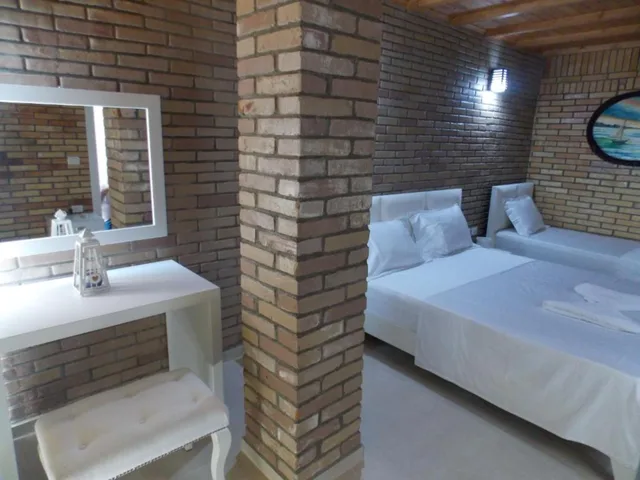 غرفة ديلوكس ثلاثية بإطلالة على البحر، Hotel Piccollino 10/10